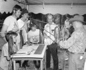 Claude Sheppard demonstrating whip braiding at the 1978 Florida Folk Festival - White Springs, Florida