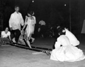 University of Florida students Estrella and David Larioza performing "Tinikling", the Philippine bamboo stick dance at the 1961 Florida Folk Festival - White Springs, Florida.