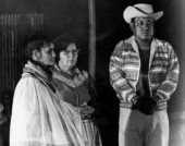 Betty Mae Jumper, (center), head of the Seminole Indian tribal council, with Lottie Shore and unidentified man - White Springs, Florida