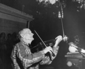 Zeke Stephens of Panama City playing his fiddle at the 1977 Florida Folk Festival - White Springs, Florida.
