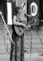 Singer-guitarist Jo Ann Cox performing at the 1976 Florida Folk Festival - White Springs, Florida.