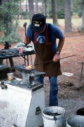 J. C. Hawkins demonstrating blacksmithing- White Springs, Florida.