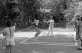 Children playing jump rope in the Children's Folklore Area at the 1985 Florida Folk Festival - White Springs, Florida