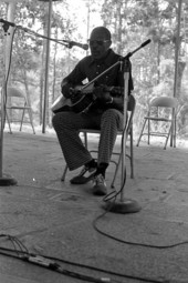 Albert "Buck" Thompson playing blues guitar at the 1985 Florida Folk Festival - White Springs, Florida