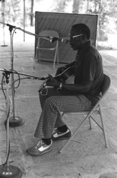Albert "Buck" Thompson playing blues guitar at the 1985 Florida Folk Festival - White Springs, Florida