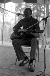 Albert "Buck" Thompson playing blues guitar at the 1985 Florida Folk Festival - White Springs, Florida