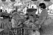 Evelyn Caffee Parks of Winter Haven showing her palmetto and palm crafts at the 1986 Florida Folk Festival - White Springs, Florida