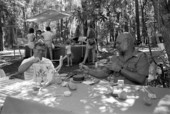 Toymaker Dennis Henry, right, and Luther Rozar playing with toys at the 1987 Florida Folk Festival - White Springs, Florida