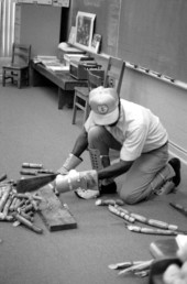 Man explaining sugarcane harvesting to class - Florida