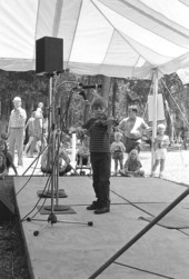 Young boy playing in the Florida State Fiddlers Competition at the 1988 Florida Folk Festival - White Springs, Florida