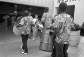 Bert Reyes and the Trinidadian Steel Band carrying steel drums - Miami, Florida.