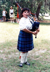 Girl playing bagpipes - Florida.