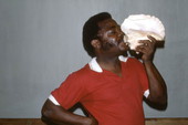 Limone Joseph demonstrating po lambi (shell) playing - Miami, Florida.