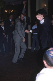 Men Chassidic dancing at Korf bar mitzvah - Miami Beach, Florida.