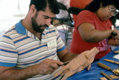 Jose Orta demonstrating wood-carving at the Traditions Festival - Miami, Florida.