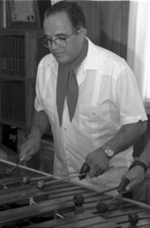 Close up of one of the members of Marimba Mayalandia perform in the Rivera residence - Orlando, Florida.