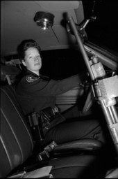 Jennifer Smith policewoman in her police car - Tallahassee, Florida.