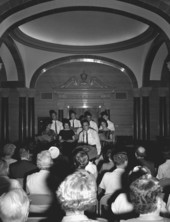 Director Dr. Delbert Sterrett introducing the University of Florida's glee club at the Stephen Foster Center - White Springs, Florida