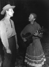 Herta Marshall plays the guitar and sings while husband David Marshall accompanies- White Springs, Florida