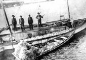 View showing a St. Andrews Bay fishing boat and crew.