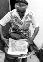 Ada Mickler displaying her Spanish drawnwork in Saint Augustine, Florida.
