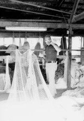 Net maker working on a fishing net in Key West, Florida.
