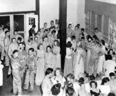 View showing servicemen with women at the Gainesville Recreation Department's Service Center.