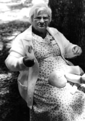 Dollmaker Bertha Burnham demonstrating dollmaking at the 1979 Florida Folk Festival in White Springs, Florida.