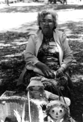 Dollmaker Grace Langdale demonstrating dollmaking at the 1979 Florida Folk Festival in White Springs, Florida.