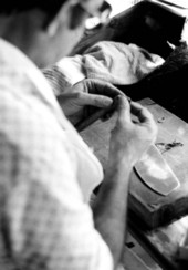 Pedro Gomez rolling a cigar