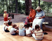 Thelma Boltin (right) telling children a story