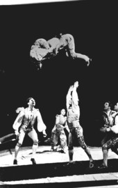 Clyde Beatty circus acrobats performing teeter-totter act