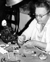 Doll maker Mary Boorman working on one of her dolls - White Springs, Florida