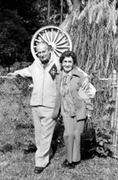 Medicine show "Doc" Art Miller standing with his wife - Starke, Florida