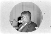 Portrait of Albert Ashley playing the saxophone - Pensacola, Florida.