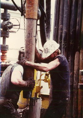 Oil workers in the Everglades
