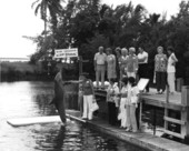 Visitors with dolphin at the Miami Seaquarium - Miami, Florida.