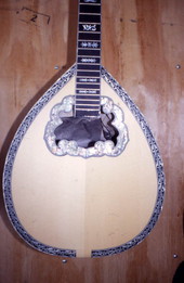 Close-up view showing a bouzouki being made by Dimitris Adamopoulos at the Hollywood Music Shop - Hollywood, Florida.