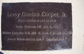 Close-up view showing the plaque for astronaut Leroy Gordon Cooper, Jr. in Space View Park near the U.S. Space Walk of Fame Museum in Titusville, Florida.