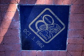 Close-up view showing Mercury 8 mission logo carved in black granite at Space View Park near the U.S. Space Walk of Fame Museum in Titusville, Florida.