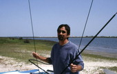 Portrait of Bob Uhlar, windsurfing instructor, at Anastasia State Park in St. Augustine, Florida.