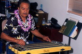 Richard "Dick" Sanft playing the Hawaiian steel guitar at his residence in Kissimmee, Florida.