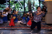 Children with hula instructor Kawehi Punahele at the Disney Polynesian Resort in Orlando, Florida.