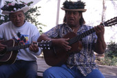 Hawaiian musicians Roy Pang, left, and Charles K. Smith performing in Melbourne, Florida.