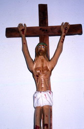 Carved item depicting the crucifixion of Jesus.