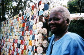 Mrs. Josephine Burns with her yoyo quilt in Eatonville, Florida.