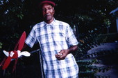 Mr. Blue with whirligig in Eatonville, Florida.
