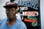 Mr. Boswell standing in front of his tavern at 344 E. Kennedy Blvd. in Eatonville, Florida.