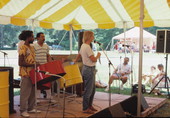 Folklorist Nancy Nusz introducing the Southwest Florida Steel Drum Band at the 1988 Florida Folk Festival- White Springs, Florida