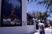 Painting and memorial plaque to John Cocoris outside the sponge exchange - Tarpon Springs, Florida.